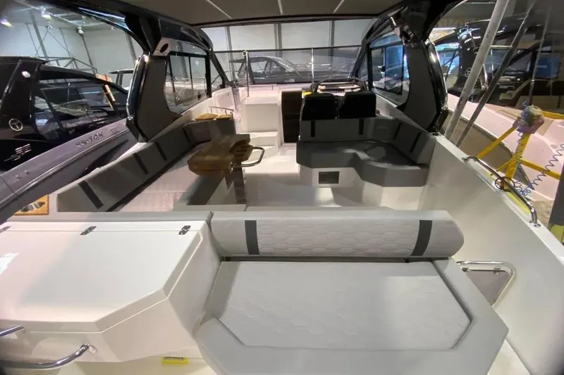  Yacht Photos Pics Interior of 2026 Hanover 387 Tuxedo Luxury Edition boat, featuring sleek seating and modern design.