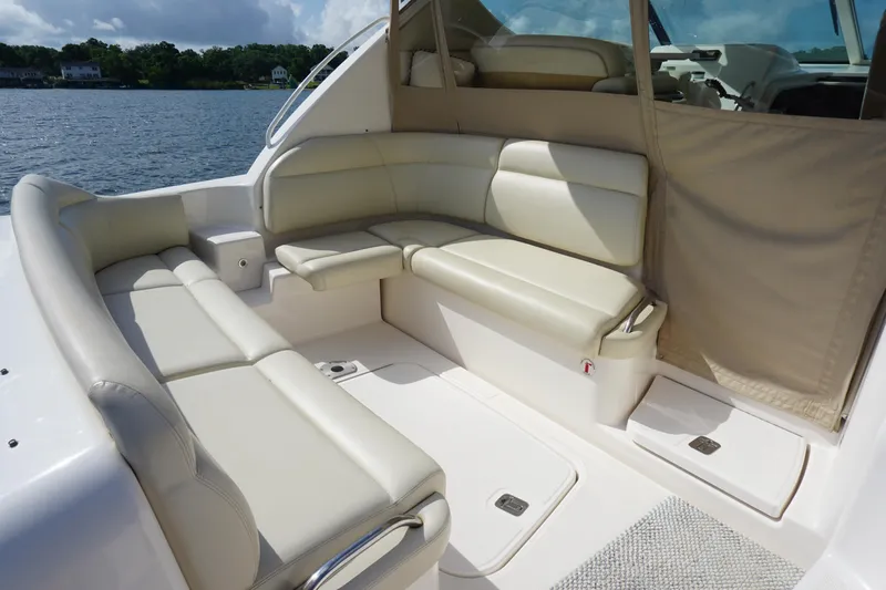 The Pearl Yacht Photos Pics Luxurious seating area on 2007 Tiara Yachts 3900, featuring cream leather upholstery.