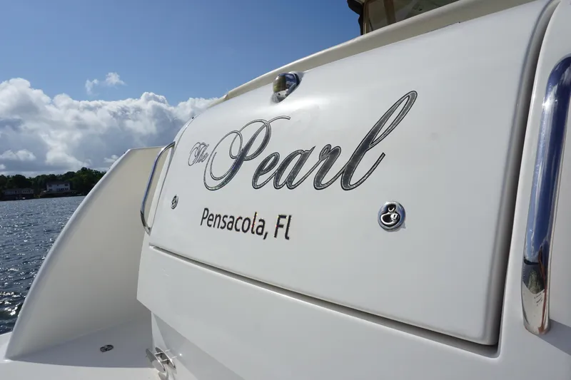 The Pearl Yacht Photos Pics 2007 Tiara Yachts 3900 named "The Pearl" in Pensacola, FL, docked by the water.