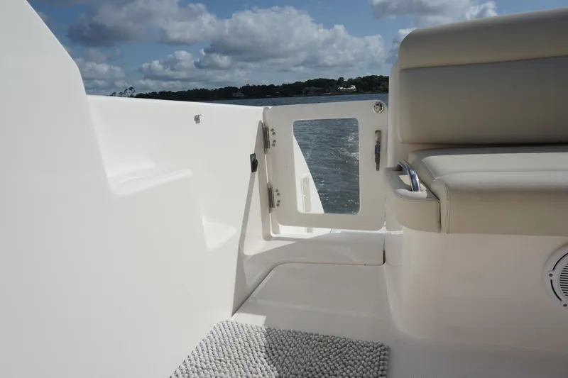 The Pearl Yacht Photos Pics 2007 Tiara Yachts 3900 boat deck with open door, beige seating, and ocean view.