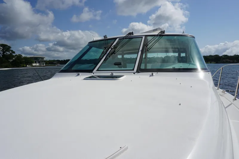 The Pearl Yacht Photos Pics 2007 Tiara Yachts 3900 on water, showcasing sleek design and windshield.