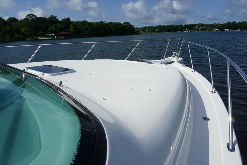 The Pearl Yacht Photos Pics 2007 Tiara Yachts 3900 on calm water with clear sky.