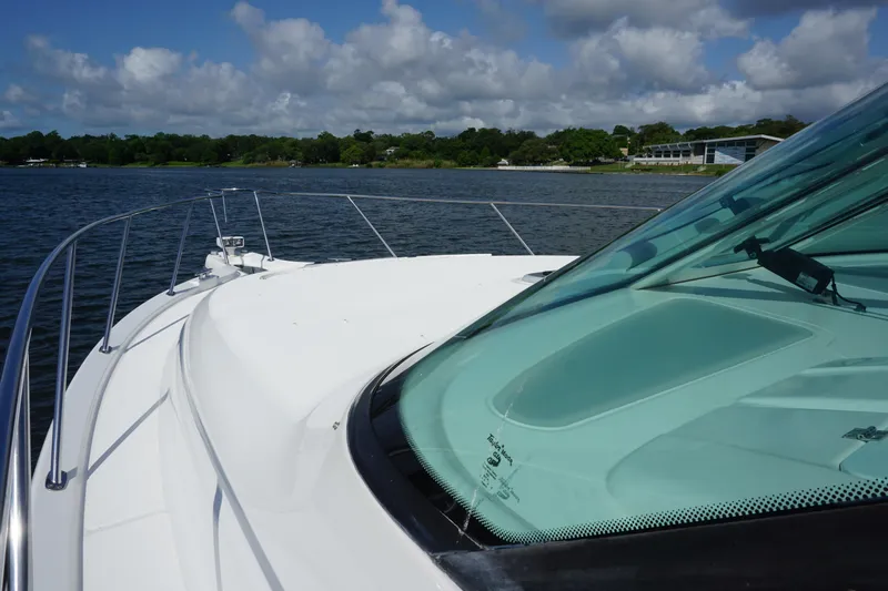 The Pearl Yacht Photos Pics 2007 Tiara Yachts 3900 on water, showcasing sleek design and clear skies.