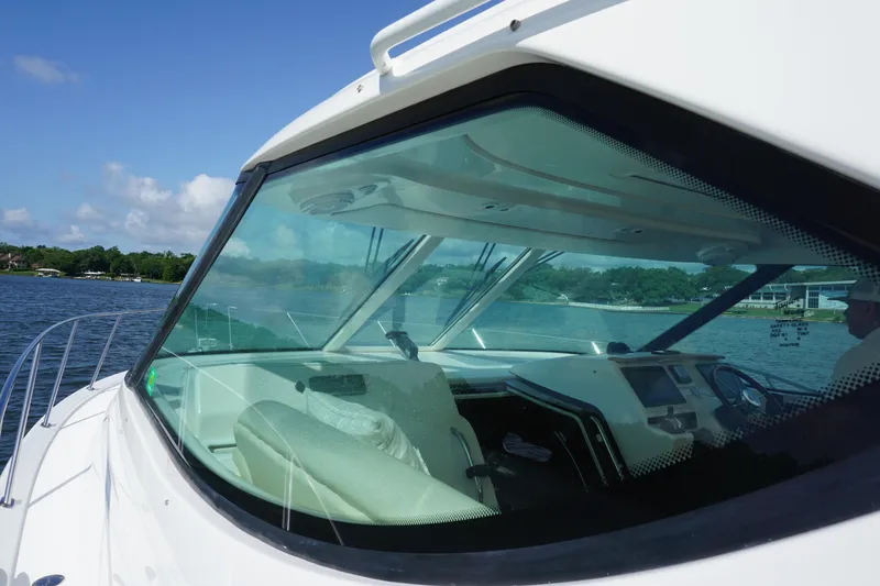 The Pearl Yacht Photos Pics 2007 Tiara Yachts 3900 on water, showcasing cockpit and helm.