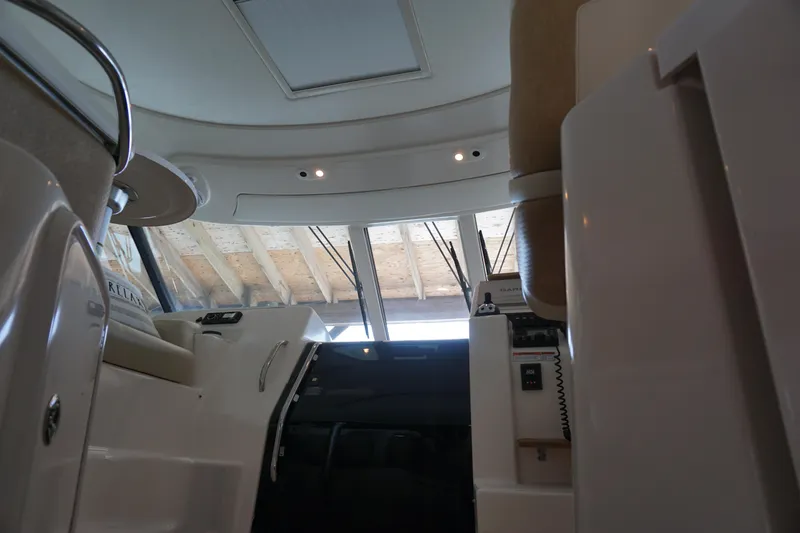 The Pearl Yacht Photos Pics Interior view of 2007 Tiara Yachts 3900, showcasing helm and seating area.