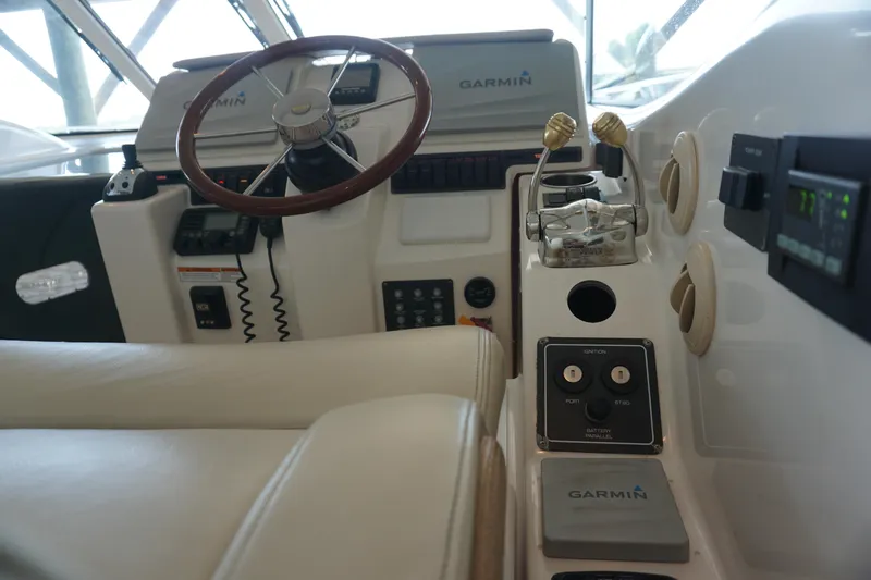The Pearl Yacht Photos Pics 2007 Tiara Yachts 3900 helm with Garmin navigation and dual throttle controls.