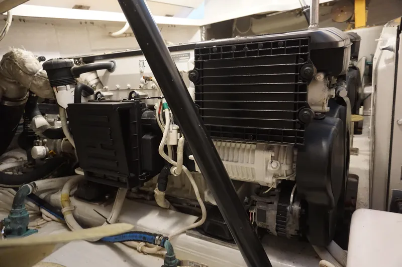 The Pearl Yacht Photos Pics Engine compartment of a 2007 Tiara Yachts 3900, showcasing mechanical components and wiring.