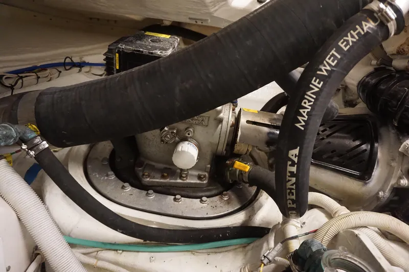 The Pearl Yacht Photos Pics Engine compartment of 2007 Tiara Yachts 3900 with marine wet exhaust system.