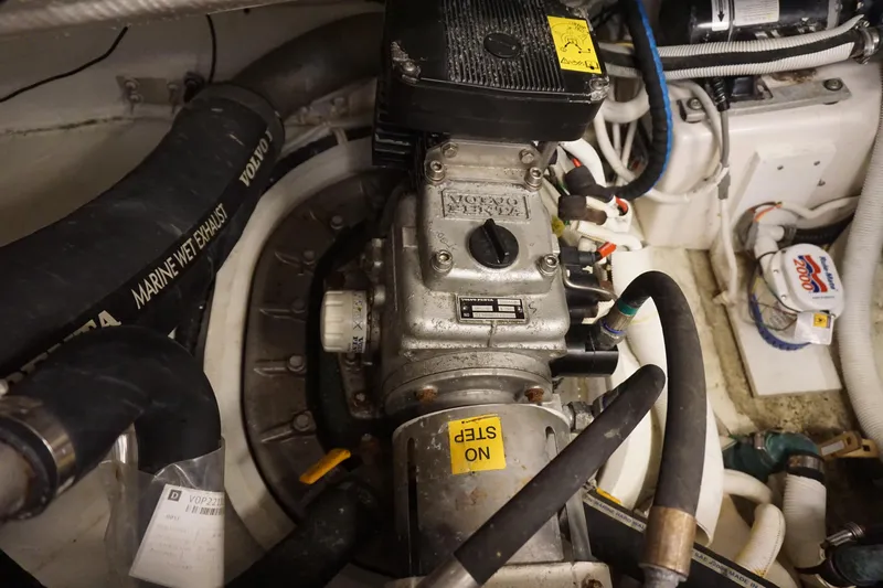 The Pearl Yacht Photos Pics Engine room of a 2007 Tiara Yachts 3900, showcasing mechanical components and hoses.