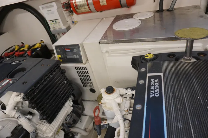 The Pearl Yacht Photos Pics Engine room of 2007 Tiara Yachts 3900 featuring Volvo Penta components and fire safety equipment.