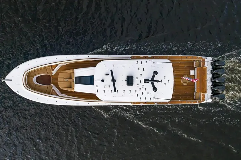 Next To Sell Yacht Photos Pics Aerial view of 2020 HCB Estrella yacht cruising on water, showcasing sleek design and powerful engines.