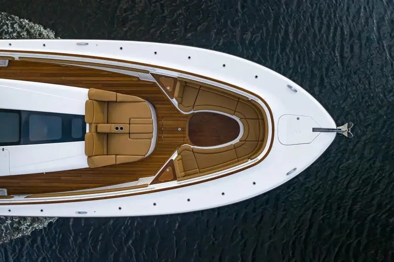 Next To Sell Yacht Photos Pics Aerial view of 2020 HCB Estrella yacht with luxurious seating on water.
