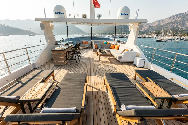 Zeemar Yacht Photos Pics Luxurious deck of 2016 Custom Aydos Yat Sanayi 100' yacht with sun loungers and seating area.