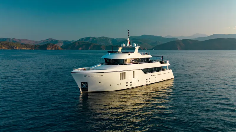 Zeemar Yacht Photos Pics Luxury yacht Custom Aydos Yat Sanayi 100' 2016 cruising on serene waters.