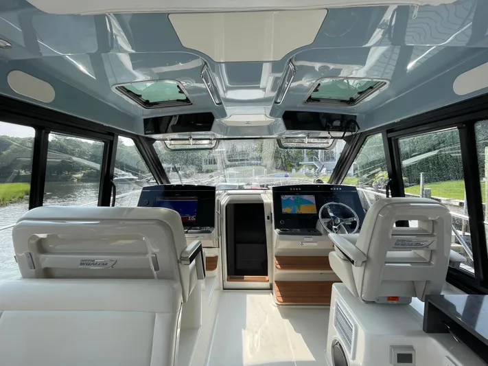 Sea Cure Yacht Photos Pics Interior of 2021 Boston Whaler 405 Conquest boat with modern navigation system.