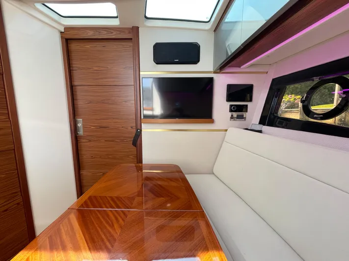 Sea Cure Yacht Photos Pics Luxurious interior of 2021 Boston Whaler 405 Conquest with wood accents and modern amenities.
