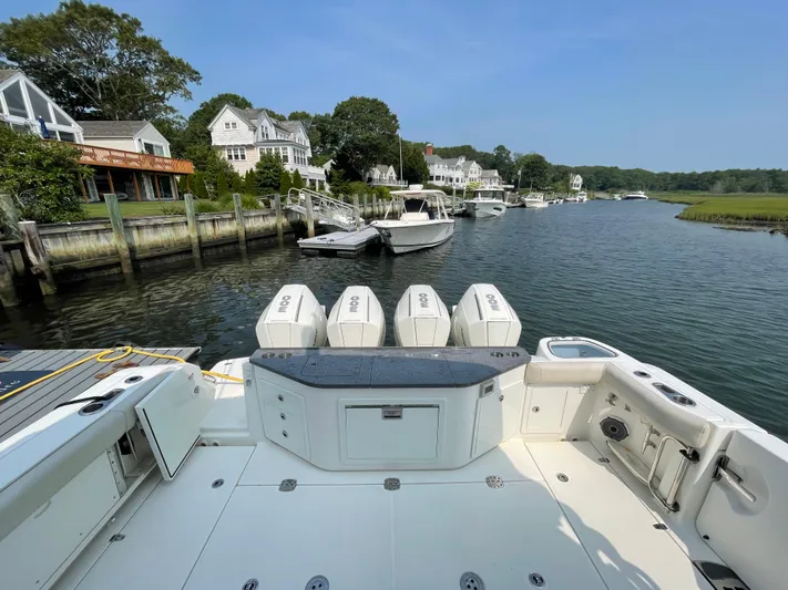 Sea Cure Yacht Photos Pics Boston Whaler 405 Conquest 2021 docked in scenic waterfront neighborhood.