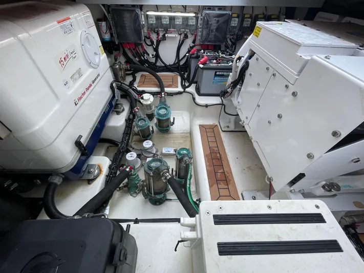 Sea Cure Yacht Photos Pics Engine room of 2021 Boston Whaler 405 Conquest, featuring generator and electrical components.