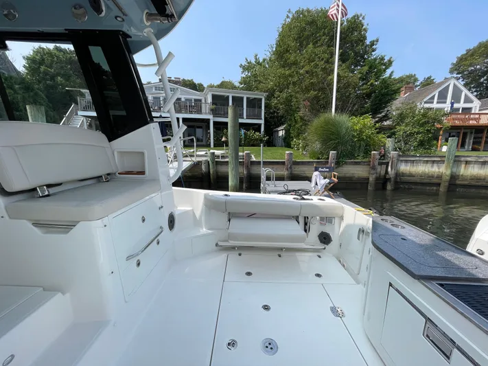 Sea Cure Yacht Photos Pics Boston Whaler 405 Conquest 2021 boat interior at a dockside location.