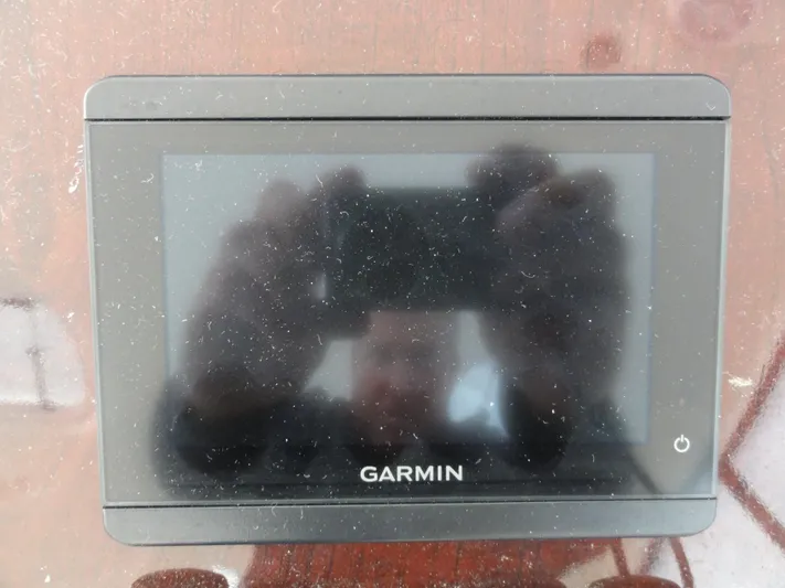  Yacht Photos Pics Garmin GPS device on a 2009 Meridian 441 Sedan boat dashboard.