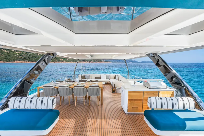  Yacht Photos Pics Luxurious Lagoon Eighty 2 yacht interior with elegant seating, dining area, and ocean view, 2026 model.