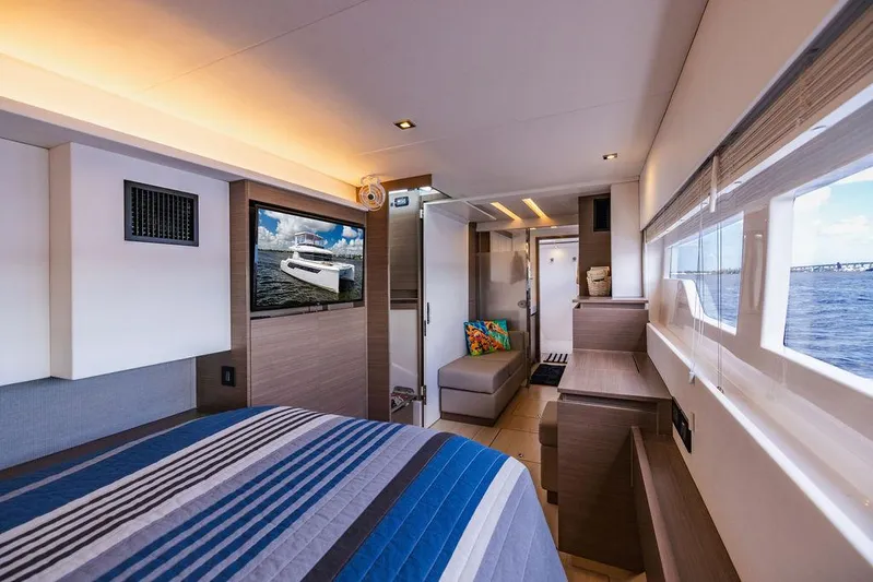 Nautilus Yacht Photos Pics Interior of 2021 Leopard 53 Powercat yacht, featuring a modern bedroom with ocean view.