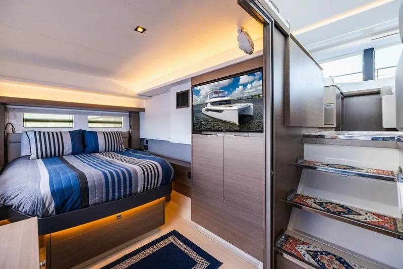 Nautilus Yacht Photos Pics Luxurious interior of 2021 Leopard 53 Powercat with modern bedroom and stylish decor.