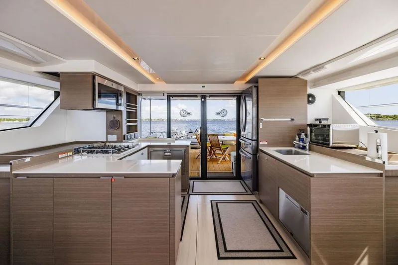 Nautilus Yacht Photos Pics Modern kitchen interior on 2021 Leopard 53 Powercat yacht with ocean view.