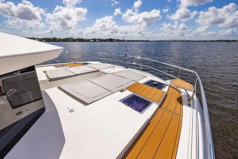 Nautilus Yacht Photos Pics 2021 Leopard 53 Powercat yacht deck with sun loungers on a sunny day.