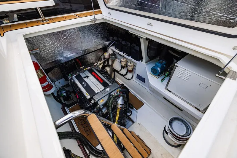 Nautilus Yacht Photos Pics Engine compartment of 2021 Leopard 53 Powercat, showcasing mechanical components and storage.