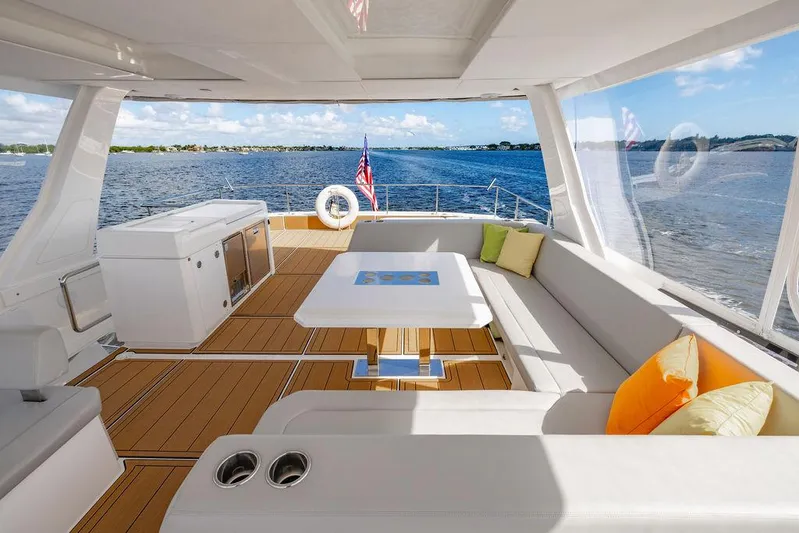 Nautilus Yacht Photos Pics Luxurious 2021 Leopard 53 Powercat yacht interior with spacious seating and ocean view.