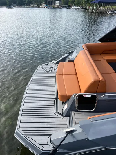  Yacht Photos Pics 2016 Cruisers Yachts 338 SOUTH BEACH with tan seating on a calm lake.