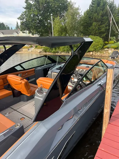  Yacht Photos Pics 2016 Cruisers Yachts 338 SOUTH BEACH docked, featuring sleek design and luxurious interior.