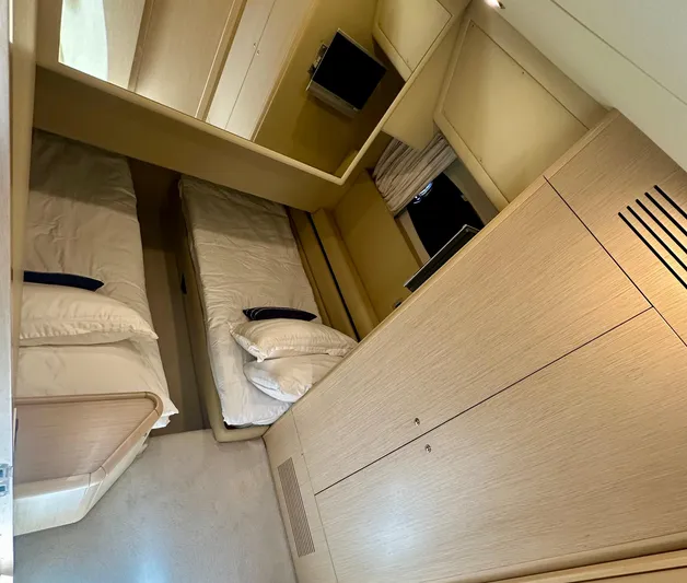 Mi Amore Yacht Photos Pics Interior of 2006 Ferretti Yachts 550 with twin beds and modern furnishings.