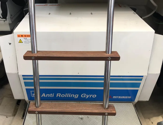 Mi Amore Yacht Photos Pics Anti Rolling Gyro system on 2006 Ferretti Yachts 550, with ladder in foreground.