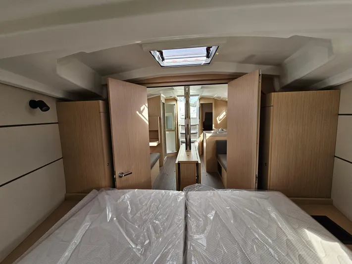  Yacht Photos Pics Interior of 2024 Beneteau Oceanis 38.1 yacht, featuring modern wood finish and spacious layout.