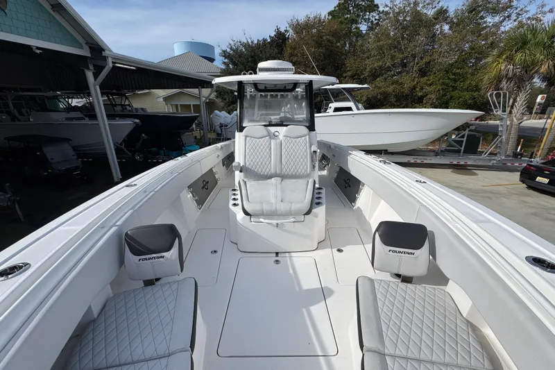  Yacht Photos Pics 2023 Fountain 38 Tournament Edition boat with sleek seating and modern design.