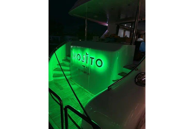 Mojito Yacht Photos Pics Illuminated "Mojito" yacht name on 2006 Hargrave Raised Pilothouse, Newport, RI.