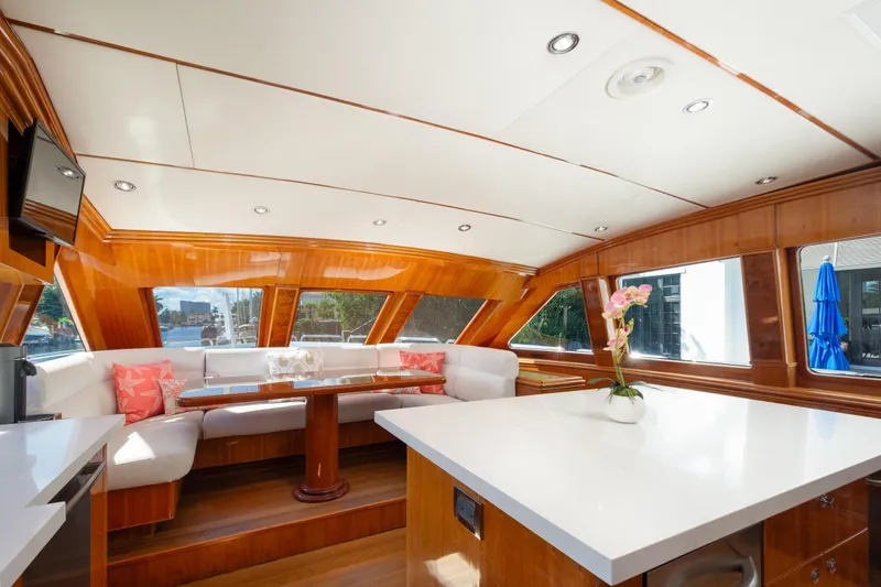 Mojito Yacht Photos Pics Luxurious 2006 Hargrave Raised Pilothouse yacht interior with elegant wood finishes and spacious seating.