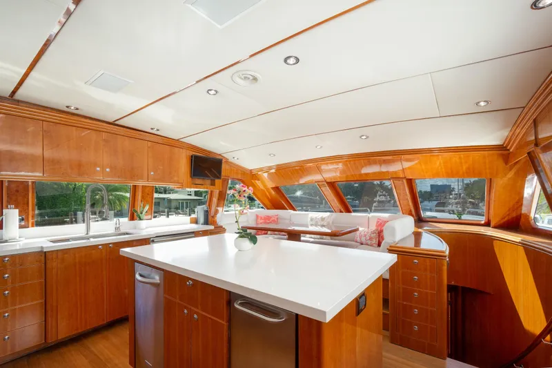 Mojito Yacht Photos Pics Luxurious 2006 Hargrave Raised Pilothouse yacht interior with modern kitchen and seating area.