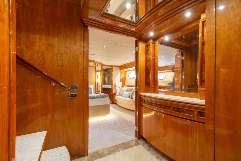 Mojito Yacht Photos Pics Luxurious 2006 Hargrave Raised Pilothouse yacht interior with elegant wood finishes and cozy bedroom.