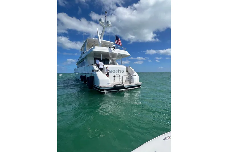 Mojito Yacht Photos Pics 2006 Hargrave Raised Pilothouse yacht on open water under a clear blue sky.