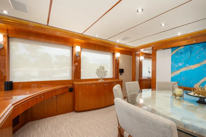 Mojito Yacht Photos Pics Luxurious interior of 2006 Hargrave Raised Pilothouse yacht with elegant dining area.