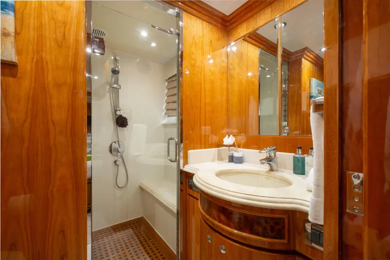 Mojito Yacht Photos Pics Luxurious 2006 Hargrave Raised Pilothouse yacht bathroom with wood accents and modern fixtures.