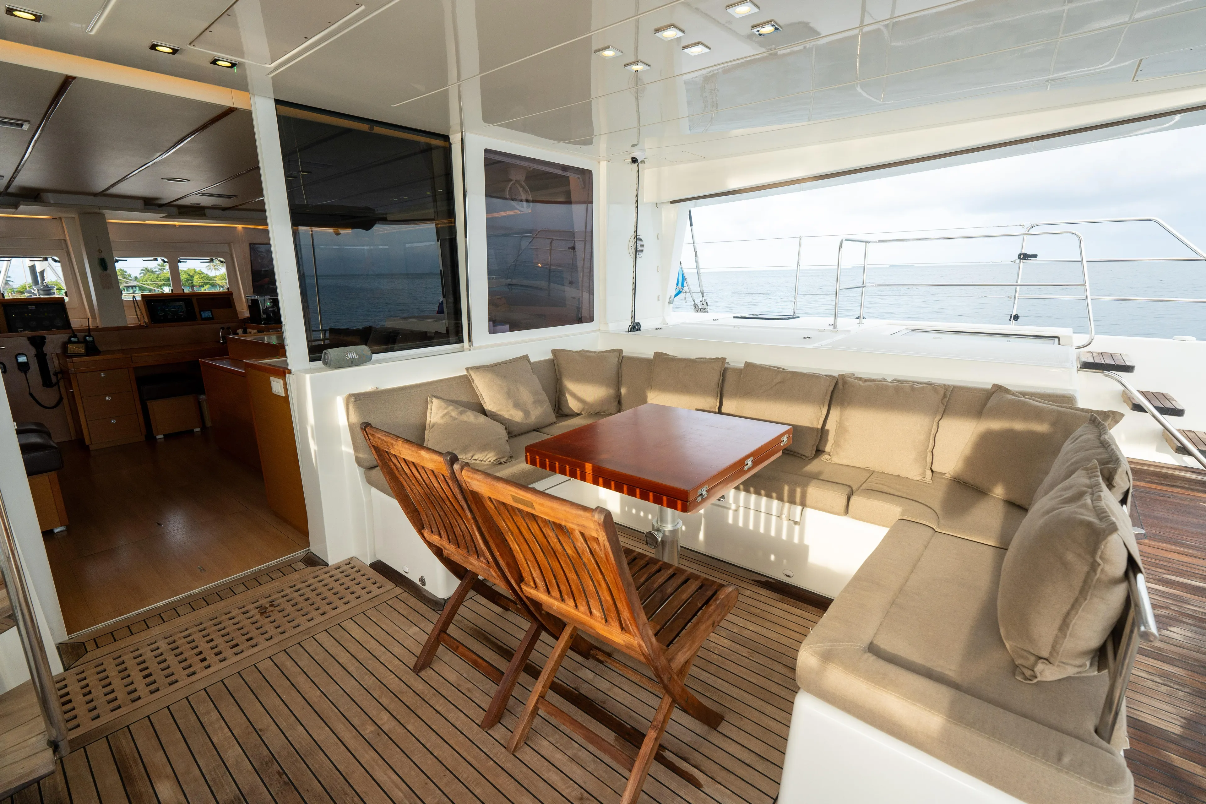 LibertÉ Yacht Photos Pics Spacious Lagoon 560 yacht interior with cozy seating and ocean view, 2011 model.