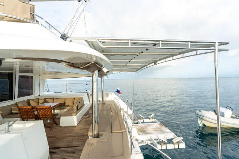 LibertÉ Yacht Photos Pics Luxurious 2011 Lagoon 560 yacht with spacious deck and ocean view.