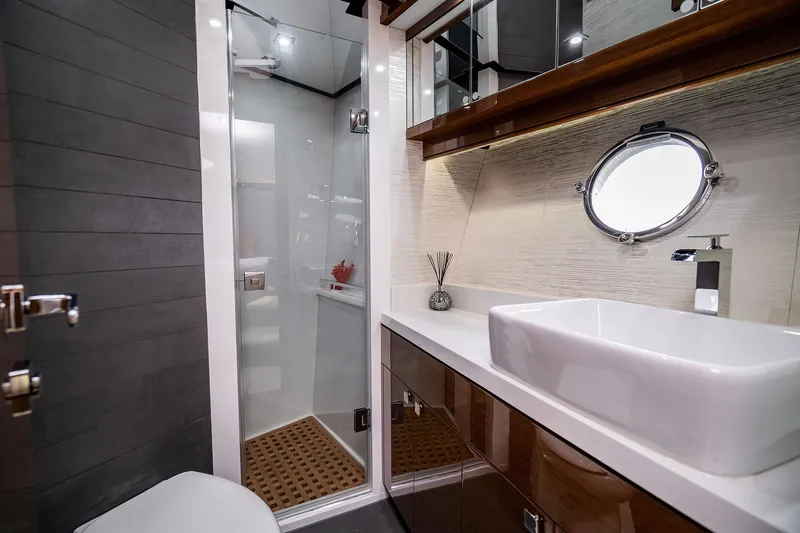  Yacht Photos Pics Luxurious bathroom in 2026 Neptunus 650E yacht with modern fixtures and elegant design.