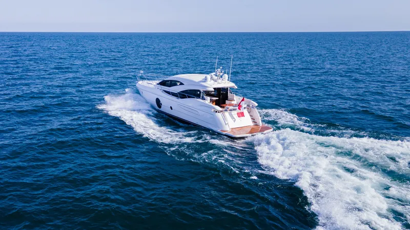  Yacht Photos Pics Luxury Neptunus 650E yacht cruising on open sea, 2026 model.