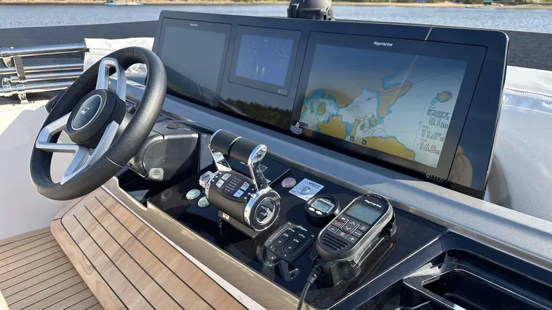 F65012 Yacht Photos Pics 2024 Princess F65 yacht dashboard with navigation screens and controls.