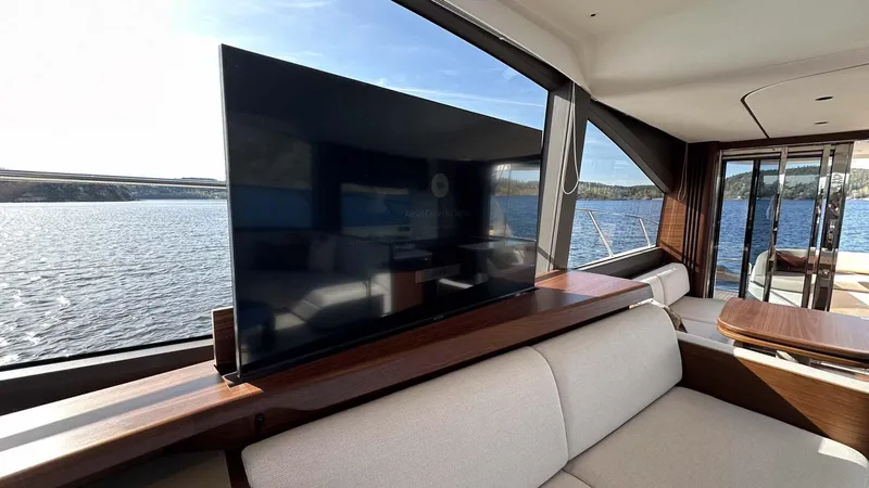 F65012 Yacht Photos Pics Luxurious interior of 2024 Princess F65 yacht with scenic ocean view.